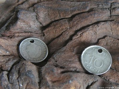 Muntje 10 cent, 14mm, antiek zilverkleur