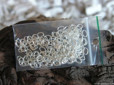 Ovalen ringetjes (1.0mm dik), 6×4.5mm, zilverkleur